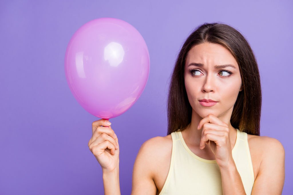 Woman is considering how to choose the best photo booth vendor for her event